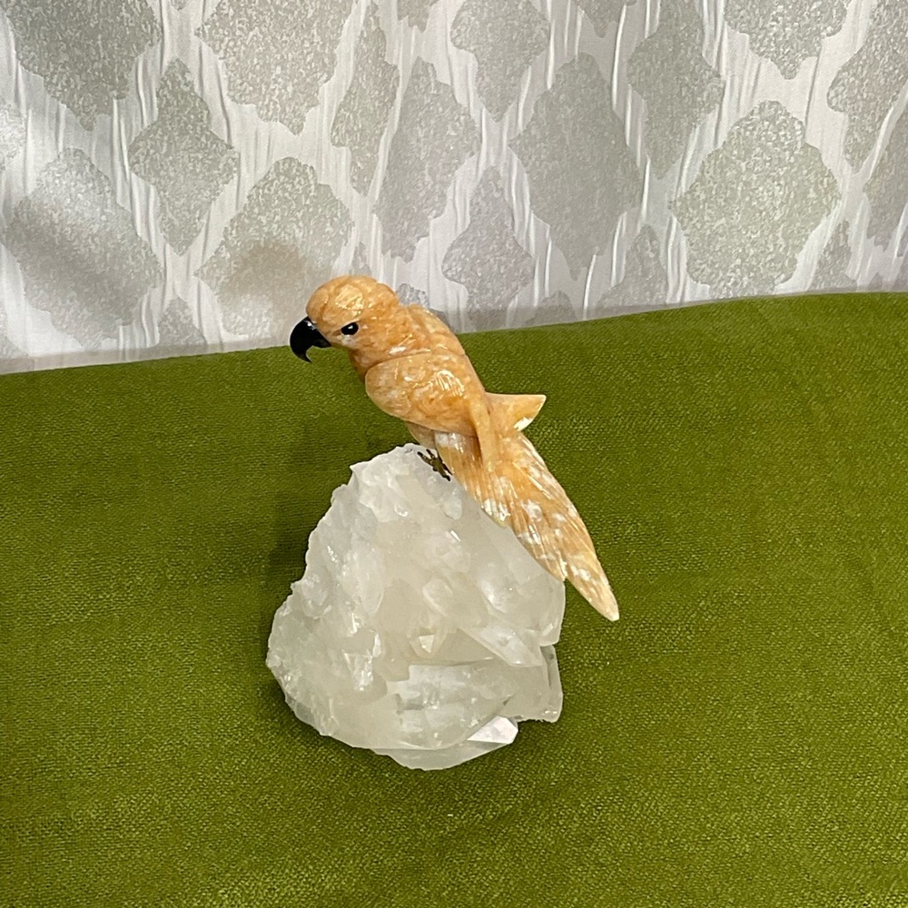 Elegant Orange Bird on Crystal Base